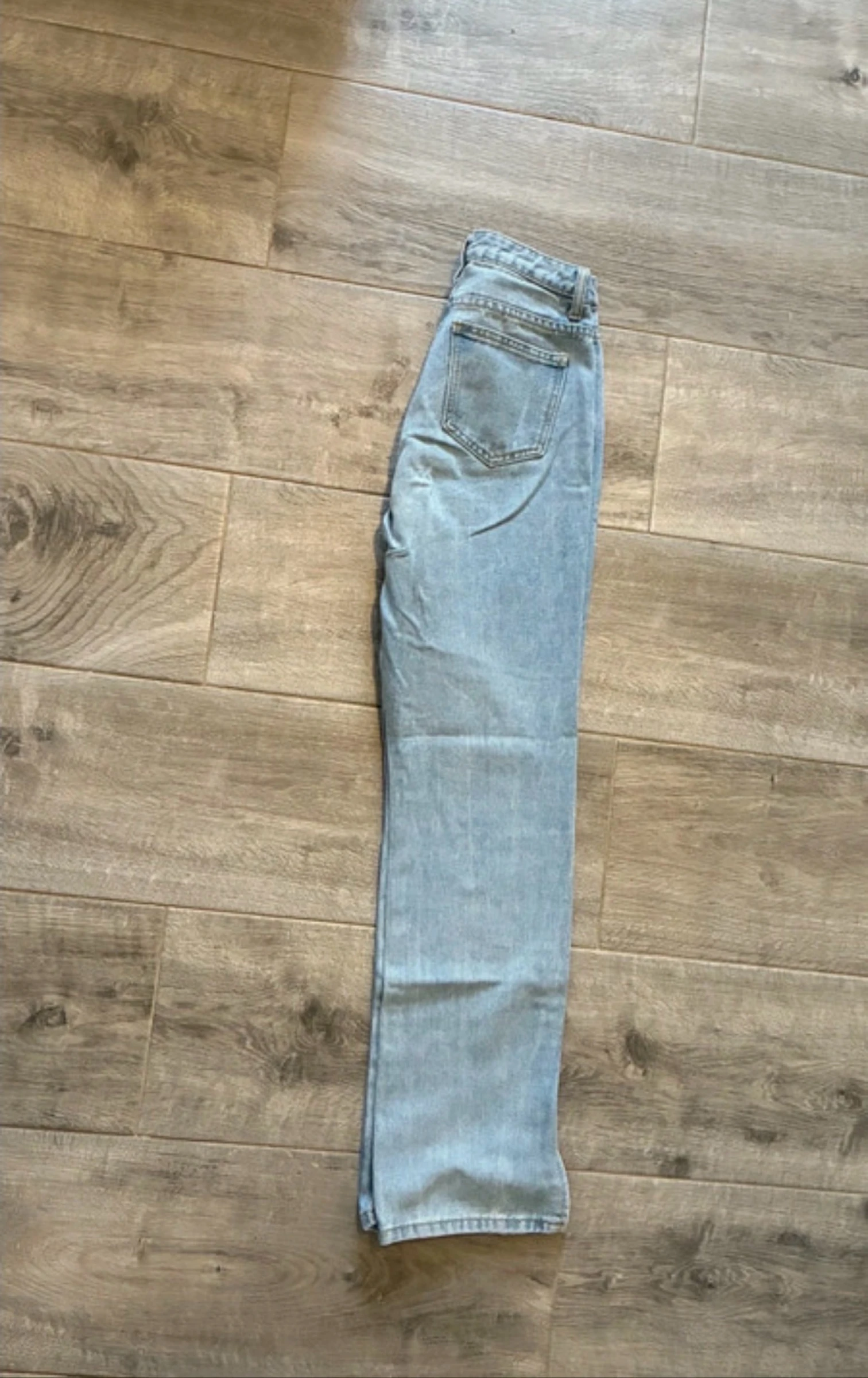Flared jean with slit – photo 4